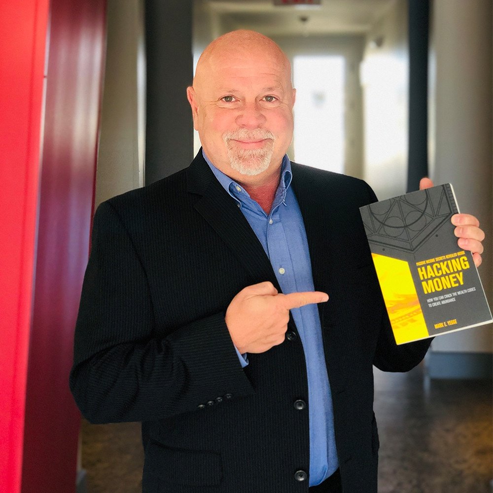 Mark Yegge with one of his books